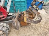 an image of a tractor and a bulldozer in the dirt