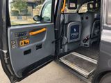 a van with the door open and the driver ' s seat down