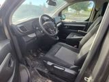 the interior of a car with a steering wheel and a dashboard