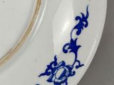 an image of a blue and white plate on a table
