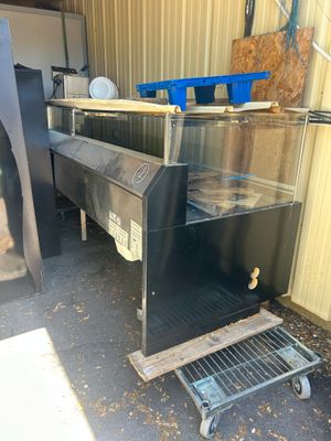 an image of a kitchen area with a grill and a table