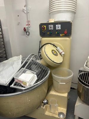 an image of a kitchen with a mixer and other equipment