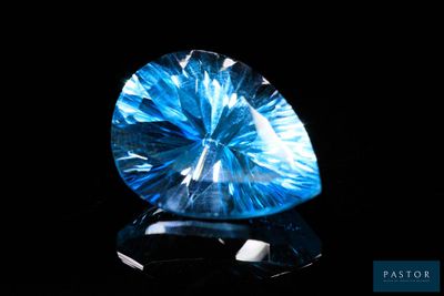 an image of a blue diamond on a black surface
