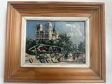 une image d'un tableau sur le mur d'un bâtiment