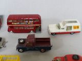 a lot of toy cars and trucks on the table