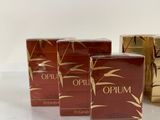 three boxes of lip butter sitting next to each other on a table