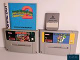 two nintendo game cartridges sitting next to each other on a table
