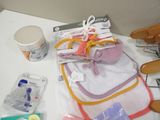 a lot of baby items that are on a table