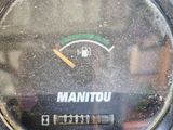 a close up of a meter on a wall