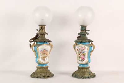 two lamps that are sitting next to each other on a table