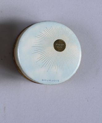a picture of a white container with a sunburst on it