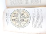 an open book with a picture of a map on it