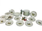 a lot of plates that are sitting on a table