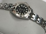 a watch that is sitting on top of a box