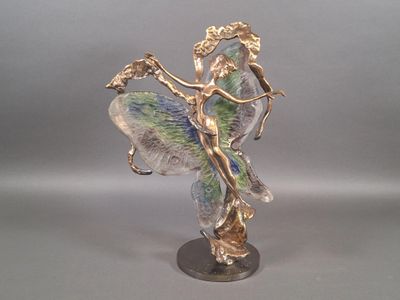 a figurine of a woman holding a flower