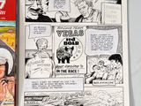 a comic book and a comic strip on a table