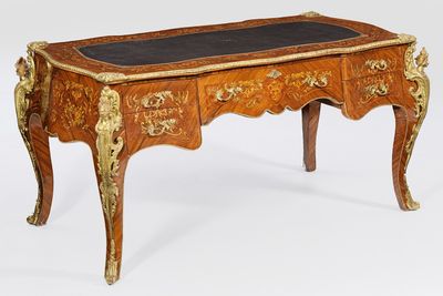 a small table with a marble top on it