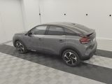 2020 toyota c - hr in a garage with a checkered floor
