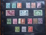 a close up of a bunch of different stamps on a table