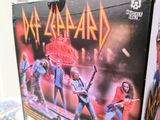 a box with a picture of a band on it