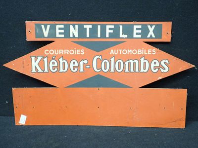 un panneau indiquant « Ventiflex » et un autre indiquant « Kieber - Columbuses »
