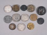 a lot of coins that are on the table