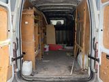 a van that has a lot of boxes in the back