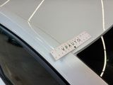 a sticker that says vapour on the hood of a car