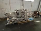 a large pile of metal and wood in a warehouse