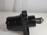 a close up of a black valve on a white surface