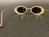 a close up of a pair of sunglasses on a table