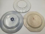 three plates that are sitting on a table