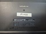 a laptop that has a sticker on the back of it