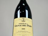 a bottle of wine that is sitting on a table