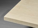 a close up view of a table with a square top