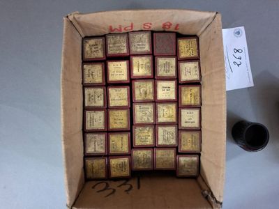 a cardboard box with a bunch of books inside of it