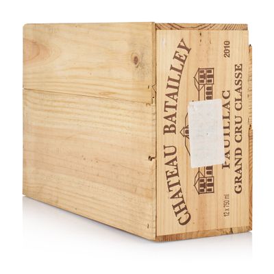 a wooden box with a label on the inside of it