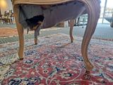 a chair that has a hole in the back of it