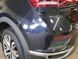 a close up of the rear end of a black car