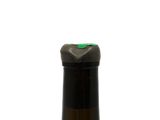 a bottle of wine that is sitting on a table
