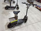 several electric scooters are lined up on the floor in a warehouse