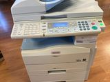 a printer that is sitting on top of a printer