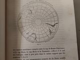 an open book with a picture of a map on it