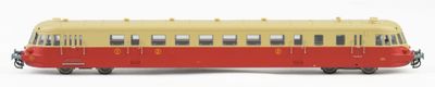 a toy bus that is sitting on a white surface