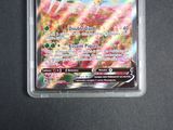 a close up of a pokemon card on a table