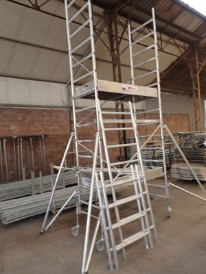 a ladder that is sitting in the middle of a building