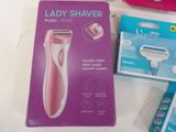 a box with a razor on top of it on a table
