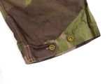 an image of a close up of a camouflage shirt on a white background