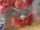 a painting of a blue and white vase with red flowers in it