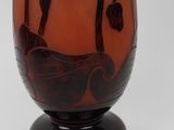 an image of a glass vase with a design on it